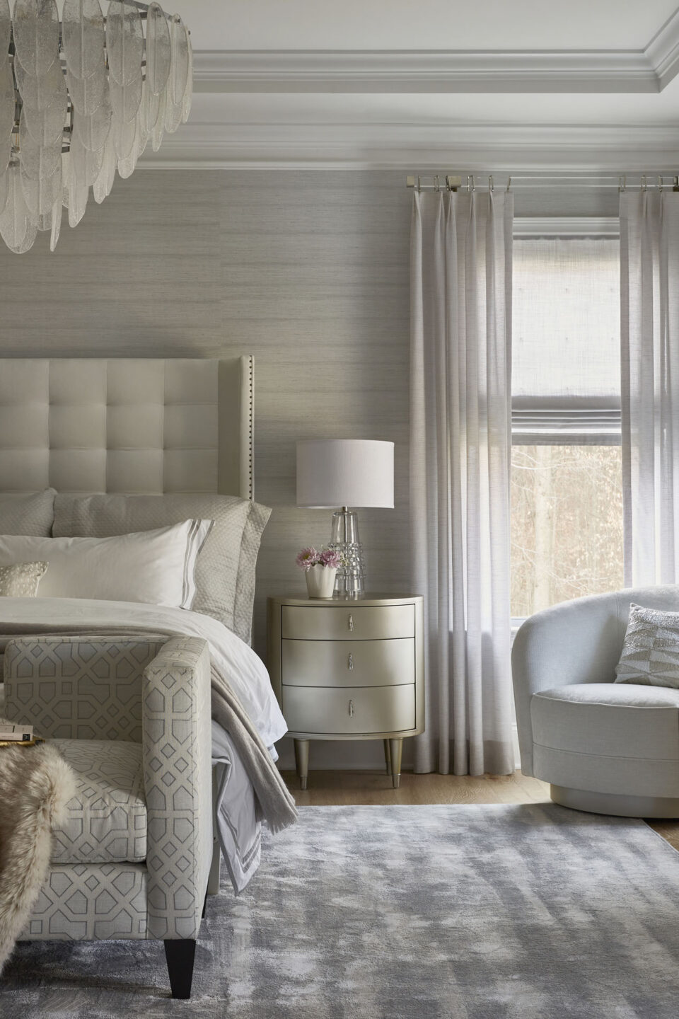Bedroom With Accent Chair And Drapery