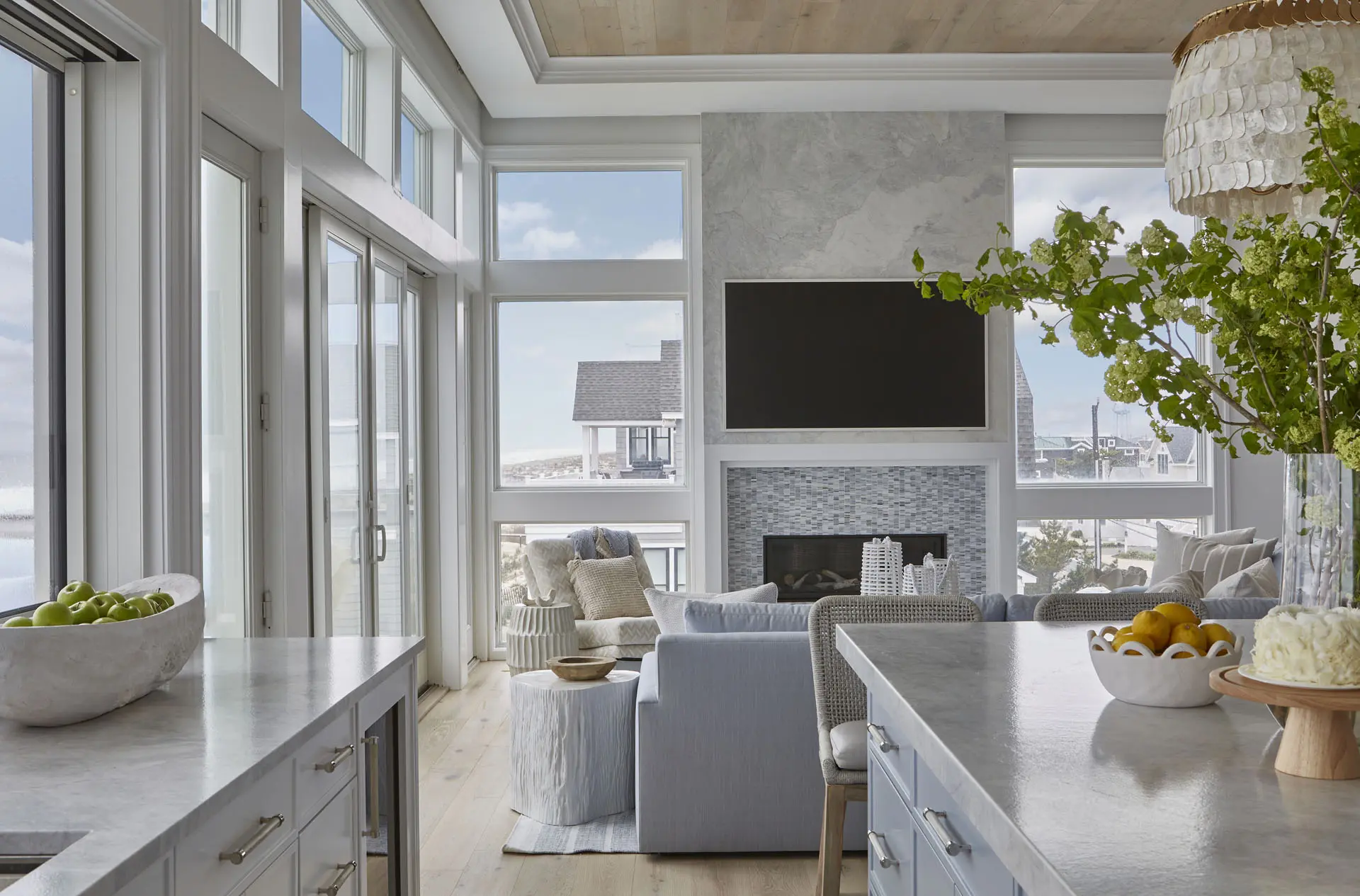 Floor To Ceiling Windows In Living Room Of Beach House