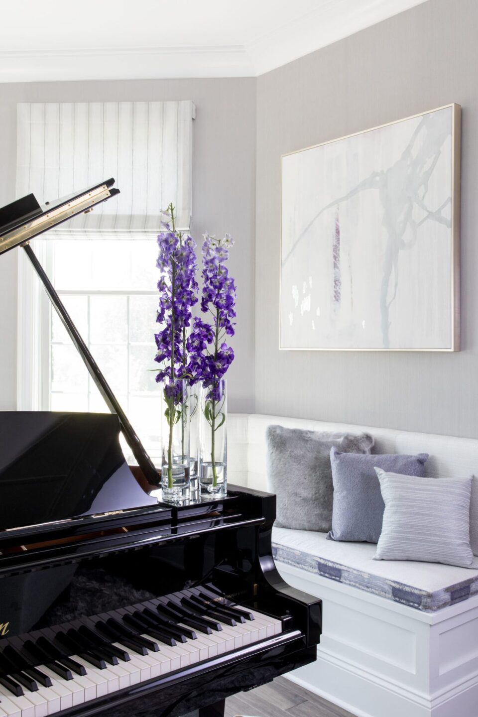 Grand Piano With Purple Flowers In Glass Vases