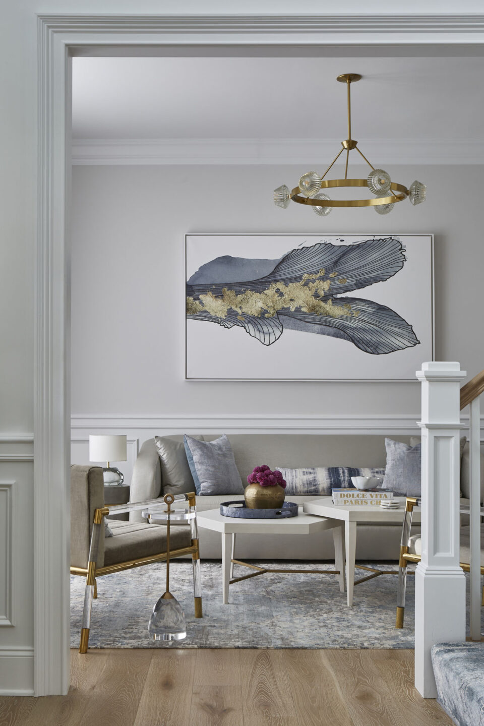Living Room Artwork And Gold Light Fixture