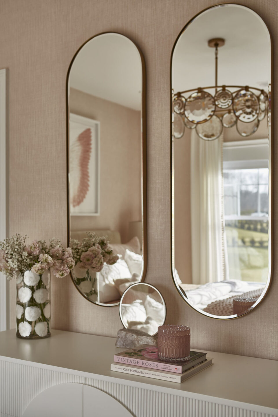 Oval Mirrors Above Dresser In Bedroom