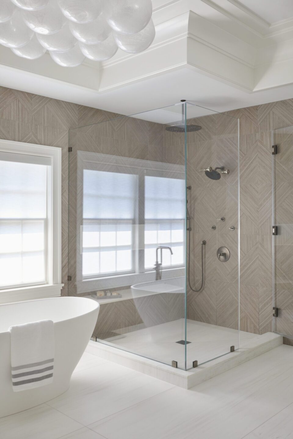 Primary Bathroom Glass Shower And Bathtub