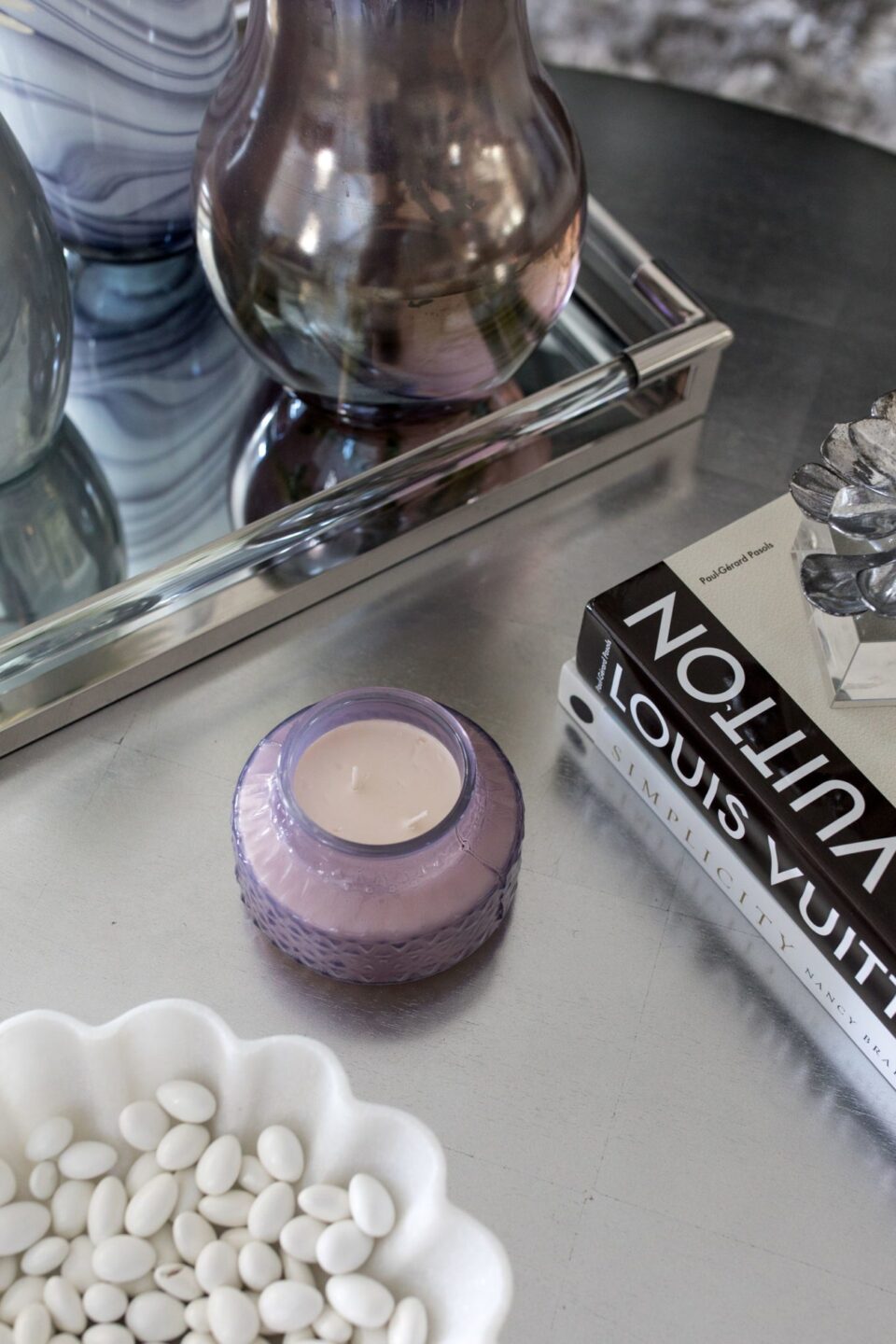 Purple Glass Candle On Coffee Table