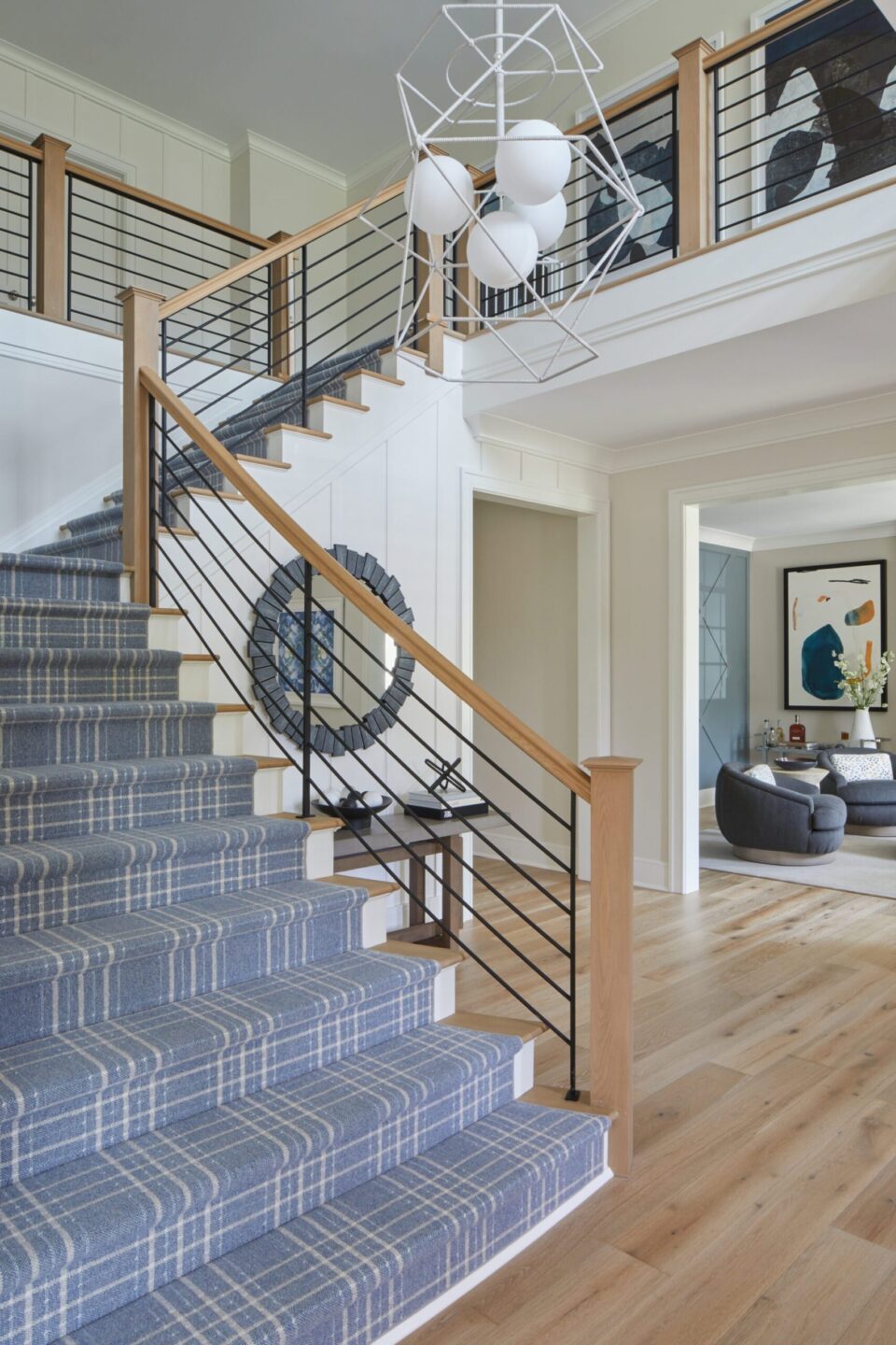 Wide Staircase With Blue Beige Runner Rug